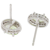 Oval green peridot earrings in 14K white gold with diamond accent, elegant jewelry piece for any occasion.